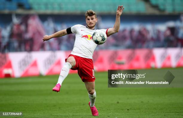 Timo Werner of Leipzig runs with the ball during the Bundesliga match between RB Leipzig and Hertha BSC at Red Bull Arena on May 27, 2020 in Leipzig,...