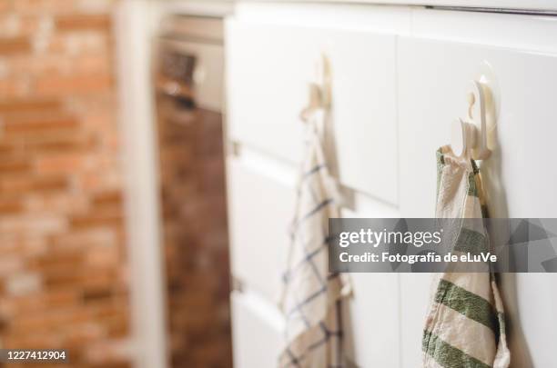 kitchen clothes hanging - dish towel stock pictures, royalty-free photos & images
