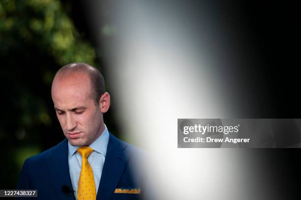 White House Advisor Stephen Miller prepares for a television interview with Fox News outside of the White House on July 15, 2020 in Washington, DC.