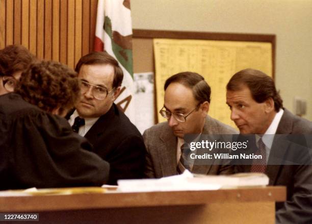 Superior Court Judge David Horowitz talks with defense attorney Charles Mathews the prosecutor and defense attorney Arthur Barens during the trial of...