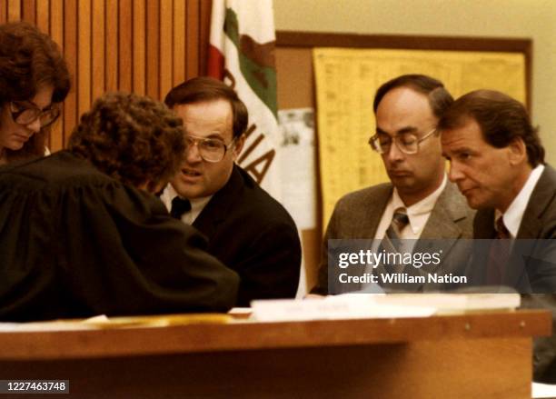 Superior Court Judge David Horowitz talks with defense attorney Charles Mathews the prosecutor and defense attorney Arthur Barens during the trial of...