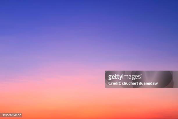 beauty sky of soft pastel pink and violet clouds at sunrise springtime - sunset gradient stock pictures, royalty-free photos & images