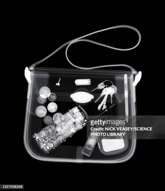 handbag with various items, x-ray - spallina foto e immagini stock
