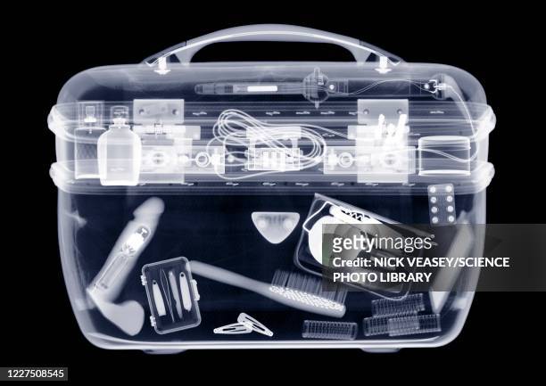 vanity case with contents, x-ray - metallic purse imagens e fotografias de stock