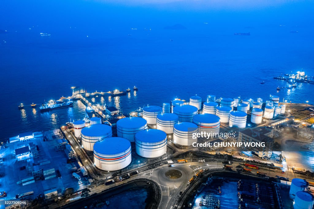 Storage tank of liquid chemical and petrochemical product tank, Aerial view at night. Hong Kong