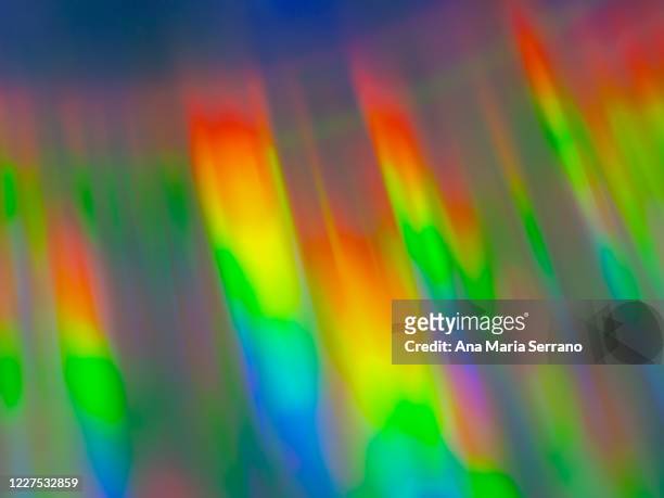 holographic reflections on the surface of a compact disc - cds stock pictures, royalty-free photos & images