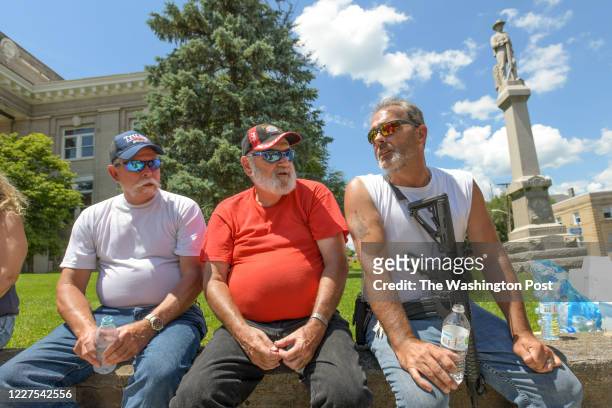 Jerry Sheets, Tom and Stacy Cawdill talk about the Confederate Statue in background and how they came to town on Friday to watch over the statue and...