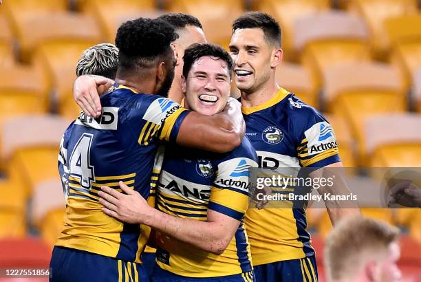 Waqa Blake and Mitchell Moses of the Eels celebrate a try during the round three NRL match between the Brisbane Broncos and the Parramatta Eels at...