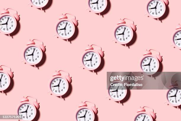 pink alarm clock - awake day stock-fotos und bilder