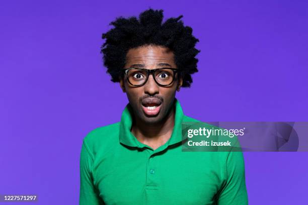 headshot of shocked young man with dreadkocks and nerdy glasses - gasping stock pictures, royalty-free photos & images