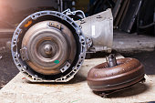 Automatic transmission with torque converter is centrifugal pump and centripetal turbine, between them guiding apparatus is a reactor. Pump wheel connected to crankshaft engine, turbine with gearbox.