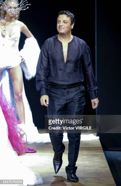 Fashion designer Zuhair Murad walks the runway during the Zuhair Murad Haute Couture Fall/Winter 2002-2003 fashion show as part of the Paris Haute...