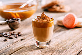 Delicious Dalgona Coffee on Rustic Background