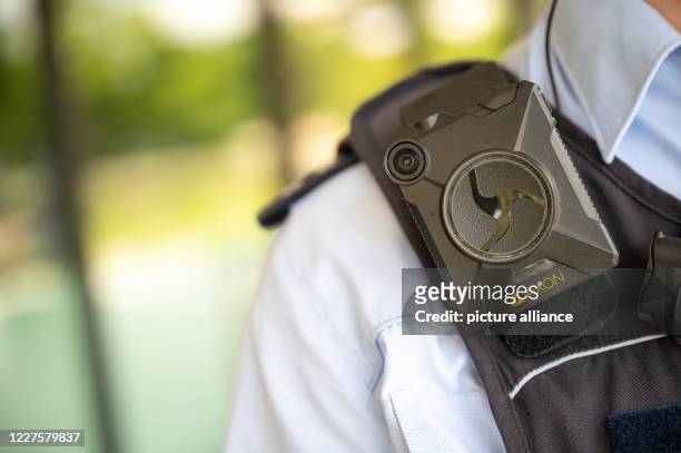 July 2020, Baden-Wuerttemberg, Stuttgart: A police officer is wearing a body cam. Photo: Sebastian Gollnow/dpa