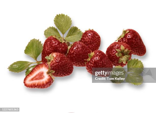 strawberries with leaves - half complete stock pictures, royalty-free photos & images