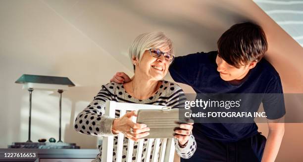 Grandma Using Tech Grandma At Desk Photos and Premium High Res Pictures - Getty Images