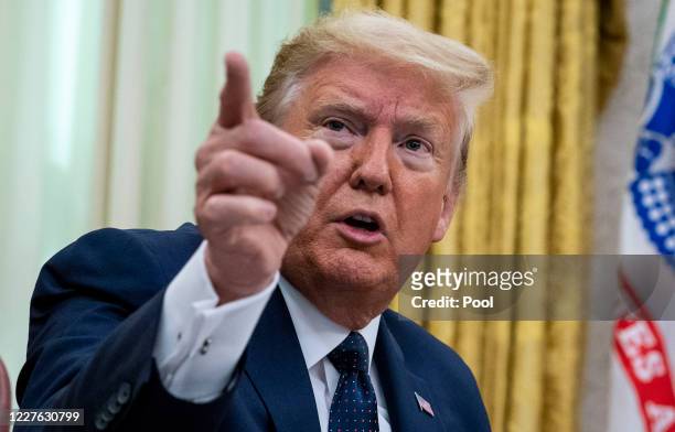 President Donald Trump speaks in the Oval Office before signing an executive order related to regulating social media on May 28, 2020 in Washington,...