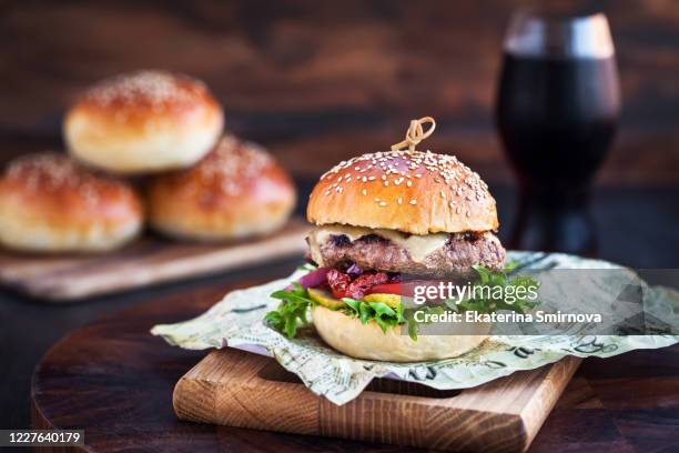 fresh  homemade burger on wooden background, closeup - hamburger stock pictures, royalty-free photos & images