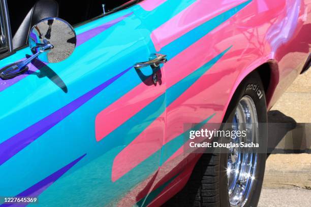 side view of a custom painted american hot rod vehicle - hot rod car stock pictures, royalty-free photos & images