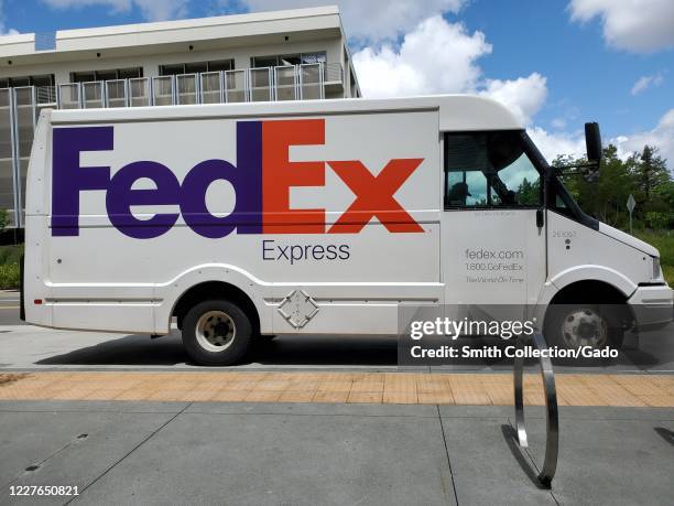 Federal Express delivery truck parked in loading dock in San Ramon, California, May 18, 2020.