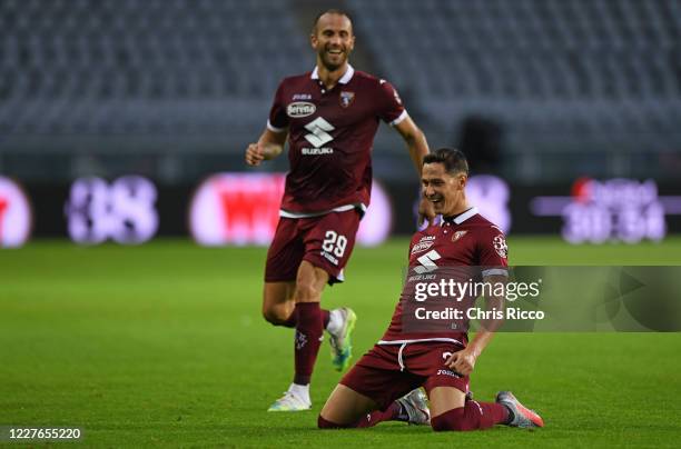 Sasa Lukic of Torino FC celebrates a goal with teammate Lorenzo De Silvestri of Torino FC during the Serie A match between Torino FC and Genoa CFC at...