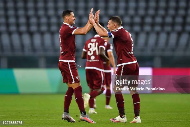 Sasa Lukic of Torino FC celebrates a goal with team mate Andrea Belotti during the Serie A match between Torino FC and Genoa CFC at Stadio Olimpico...
