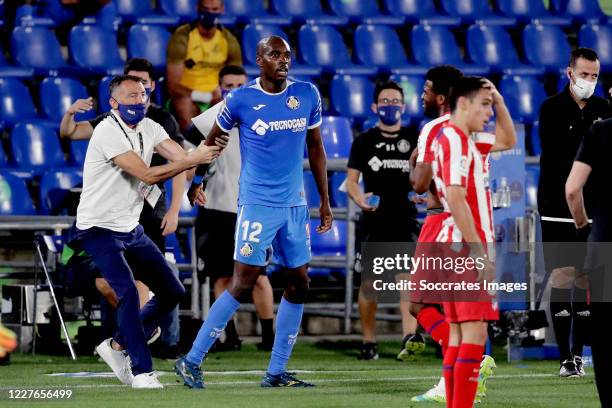 Allan Nyom of Getafe leaves the pitch after a red card during the La Liga Santander match between Getafe v Atletico Madrid at the Coliseum Alfonso...