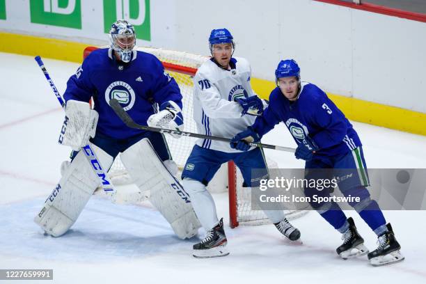 Vancouver Canucks Goaltender Jacob Markstrom and Defenseman Brogan Rafferty defend against Left Wing Tanner Pearson during the Vancouver Canucks...