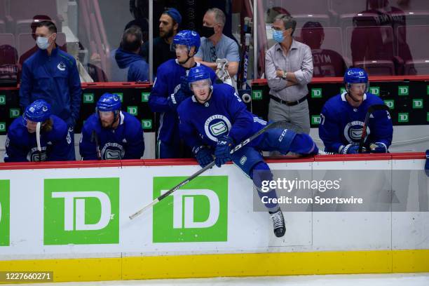 Vancouver Canucks Defenseman Brogan Rafferty jumps over the boards during the Vancouver Canucks Training Camp at Rogers Arena on July 16th, 2020 in...