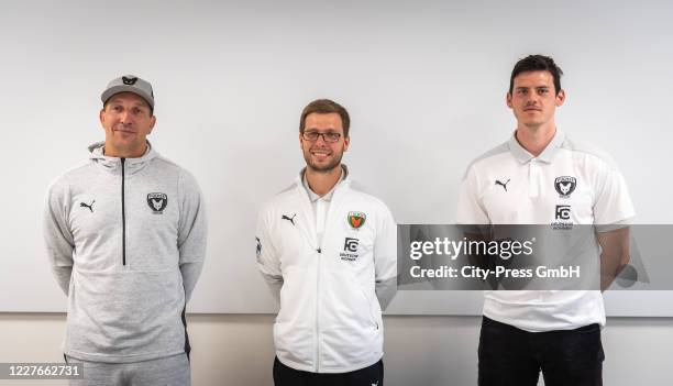 Manager Stefan Kretzschmar, coach Jaron Siewert and Simon Ernst of Fuechse Berlin attend a press conference on July 17, 2020 in Berlin, Germany.