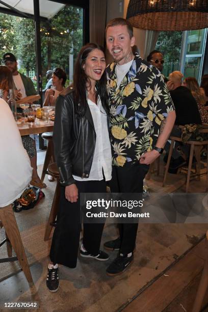 Karima McAdams and Professor Green attend the launch of Giz & Green Pizza Pies Pop-Up at Passo on July 17, 2020 in London, England.