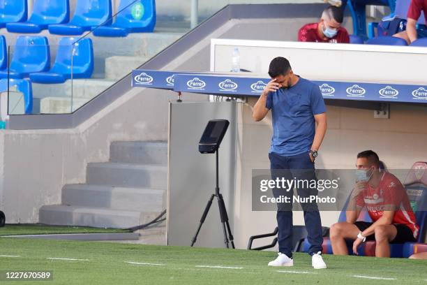 Michel head coach of Huesca crosses himself prior the La Liga Smartbank match between SD Huesca and CD Numancia at estadio El Alcoraz on July 17,...