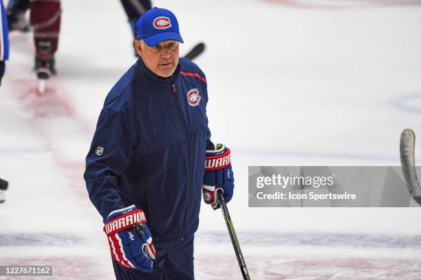 Look on Montreal Canadiens head coach Claude Julien watching over his players during drills at the Montreal Canadiens training camp on July 17 at...