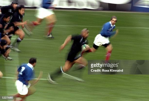 Jonah Lomu of New Zealand in action during the Semi Final match of the Rugby World Cup against France played at Twickenham in London, England. France...