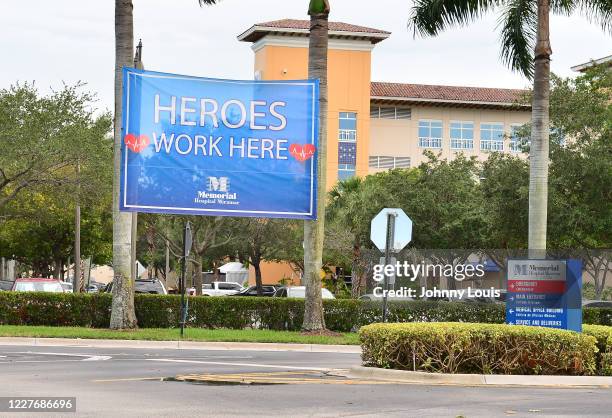 Banner reading 'Heroes Work Here' hangs at the entry at Memorial Hospital Miramar on July 18, 2020 in Miramar, Florida. U.S. President Donald Trump's...