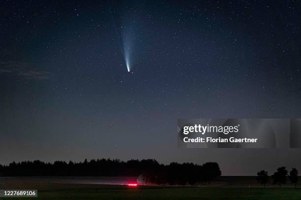 The comet C/2020 F3 is pictured on July 19, 2020 in Waldhufen, Germany. The comet was discovered in spring 2020 and is visible to the naked eye in...