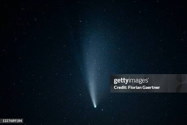 The comet C/2020 F3 is pictured on July 19, 2020 in Waldhufen, Germany. The comet was discovered in spring 2020 and is visible to the naked eye in...