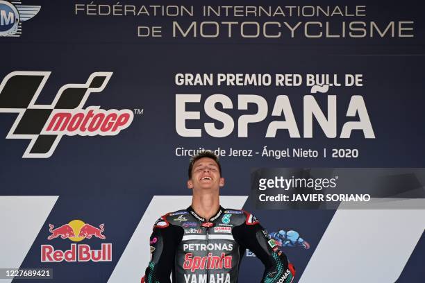 Petronas Yamaha SRT's French rider Fabio Quartararo celebrates on the podium after winning the MotoGP race of the Spanish Grand Prix at the Jerez...