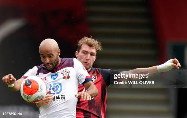 Southampton's English midfielder Nathan Redmond fights for the ball with Bournemouth's English defender Jack Stacey during the English Premier League...