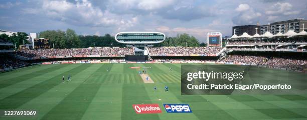 Panoramic view towards the new Media Centre at the Nursery End of the ground as Eric Upashantha of Sri Lanka bowls to Alec Stewart of England during...