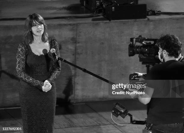 Image was converted to black and white) Monica Bellucci attend the ceremony in memory of Ennio Morricone in the suggestive ancient theater of...