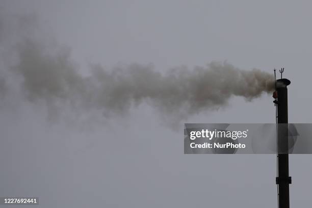 Smoke emitting from a crematorium site where Covid-19 dead bodies are cremated In Ajmer, Rajasthan, India on July 19, 2020.