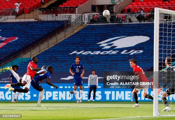 Manchester United's Ivorian defender Eric Bailly and Chelsea's French defender Kurt Zouma (2 clash heads during a challenge during the English FA Cup...