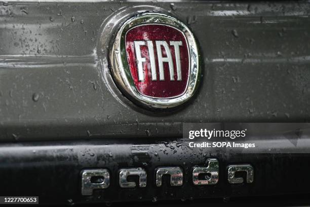 Logo of FIAT Panda, an Italian multinational automobile manufacturer, seen on a parked car in Krakow.