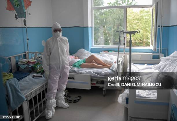 Medic visits patients infected with COVID-19 at "Victor Babes" infectious diseases hospital in Timisoara city on July 18, 2020. - After treating...
