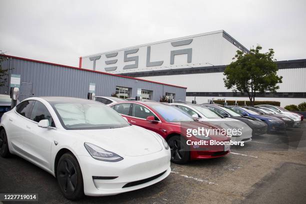Tesla Inc. Electric vehicles charge at the Tesla Supercharger station in Fremont, California, U.S., on Monday, July 20, 2020. Tesla Inc. Is scheduled...