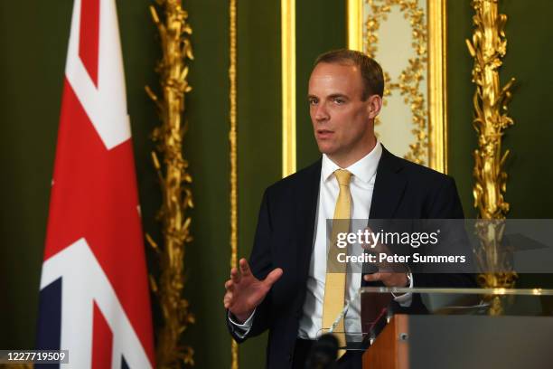 Britain's Foreign Secretary Dominic Raab speaks during a joint press conference with U.S. Secretary of State Mike Pompeo at Lancaster House on July...