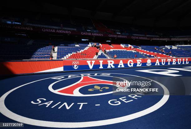 The logo of Paris Saint-Germain is seen on the ground prior to the friendly football match between Paris Saint-Germain and Glasgow Celtic FC at the...