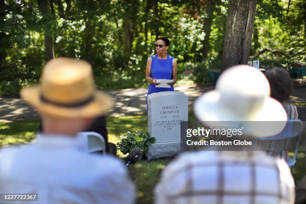 Joan Reede, the Dean for Diversity and Community Partnership at Harvard University, speaks during a gravestone dedication ceremony at Fairview...