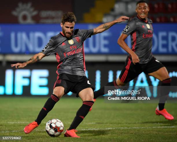 Benfica's Portuguese midfielder Rafa controls the ball prior to shooting and scoring the opening goal during the Portuguese League football match...